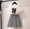 French Hepburn style playful two-piece set big tail girl strip pattern pleated skirt with bow knot